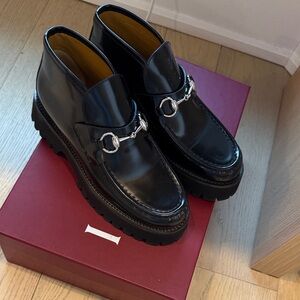 Gucci Black Leather Slip-On Loafers with Silver Accents